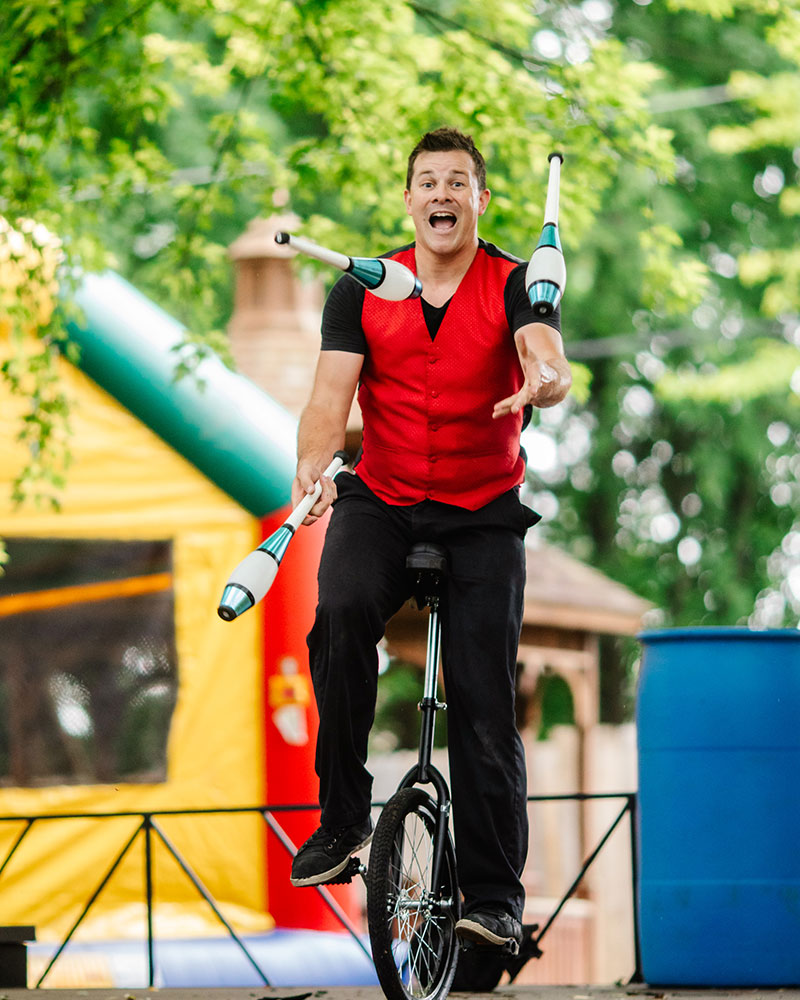 Event Talent Juggler on a unicycle